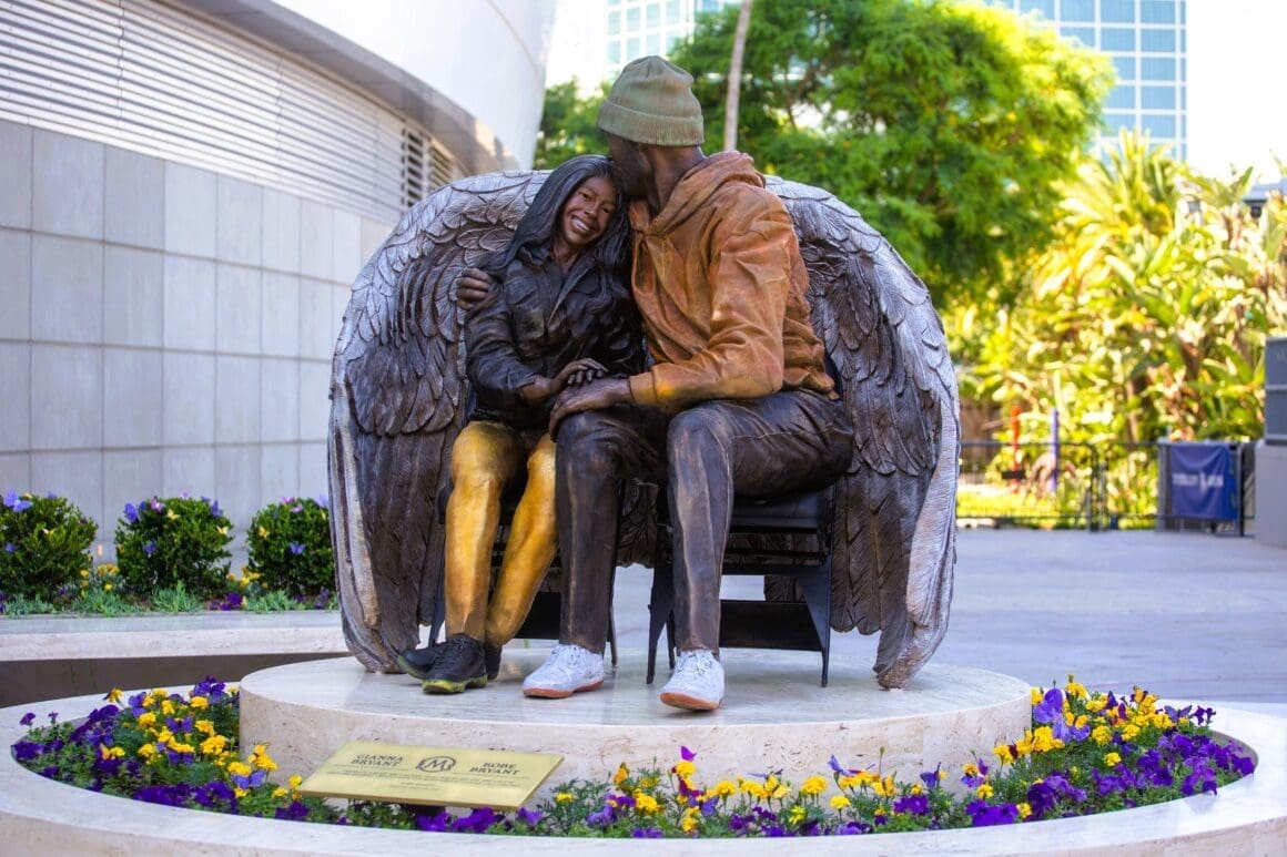 The newly statue of late Los Angeles Lakers star Kobe Bryant and his daughter, Gigi Bryant, is unveiled outside Crypto.com Arena August. 3, 2024, in Los Angeles