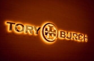 Tory Burch brand retail shop logo signboard on the storefront in the shopping mall