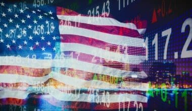 USA flag overlaid against a backdrop of financial indicators