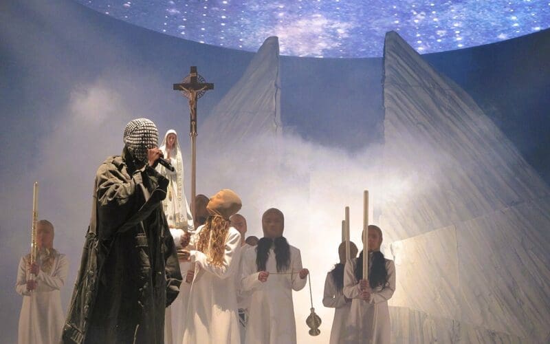 West on the Yeezus Tour in 2013. Photo by Peter Hutchins - flickr.com, CC BY 2.0, via Wikimedia Commons