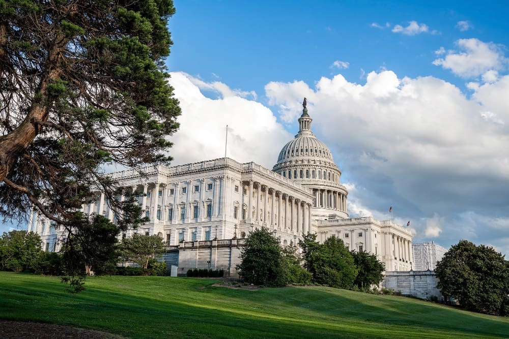 Wide low-angle view of the United States Capitol in Washington, DC
