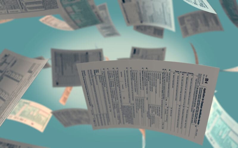 Several Usa tax forms flying (3d render)