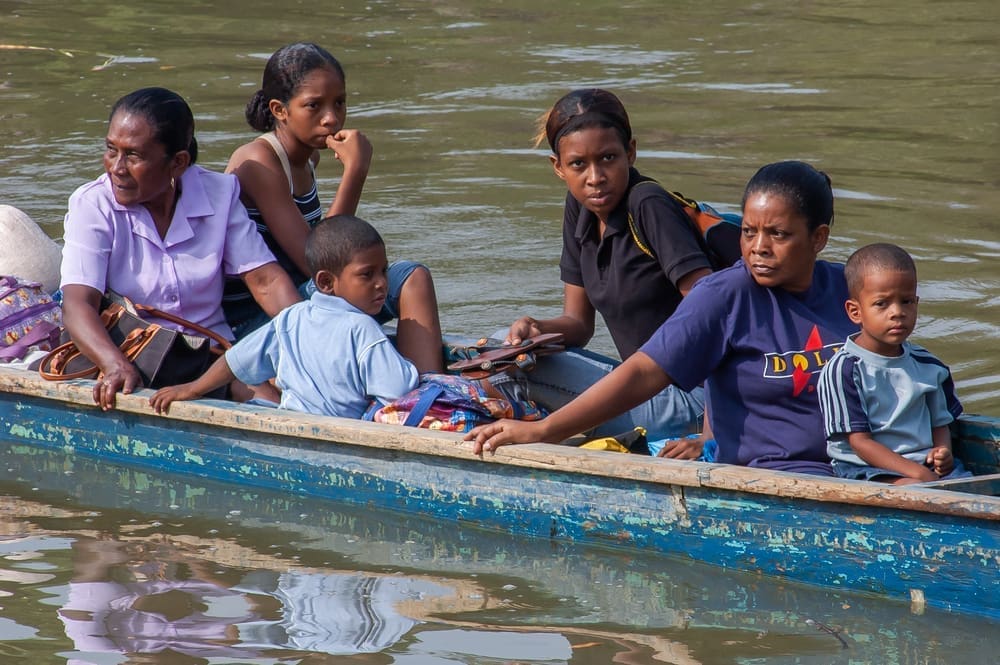 Indigenous migrants are traveling by boat in the Darien Province, Panama, Central America