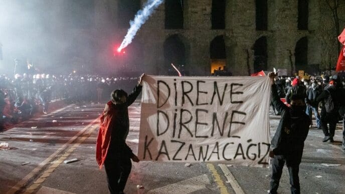 After the detention of Mayor İmamoğlu, people gathered in Saraçhane to protest his detention, calling for Rights, Law, and Justice. Saraçhane, Turkey, Istanbul, March 21, 2025. By Shutterstock.com - okanozdemir