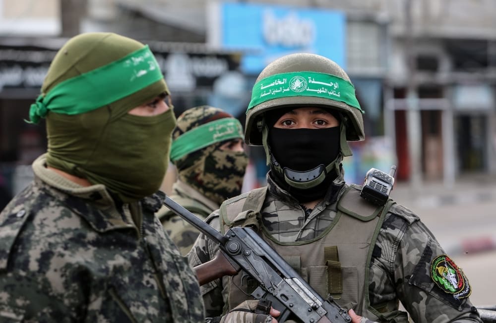 Al-Qassam Brigades members, deployed in the streets, during the 35th anniversary of the founding of the Palestinian Hamas movement, in Rafah, in the southern Gaza Strip, on December 10, 2022.