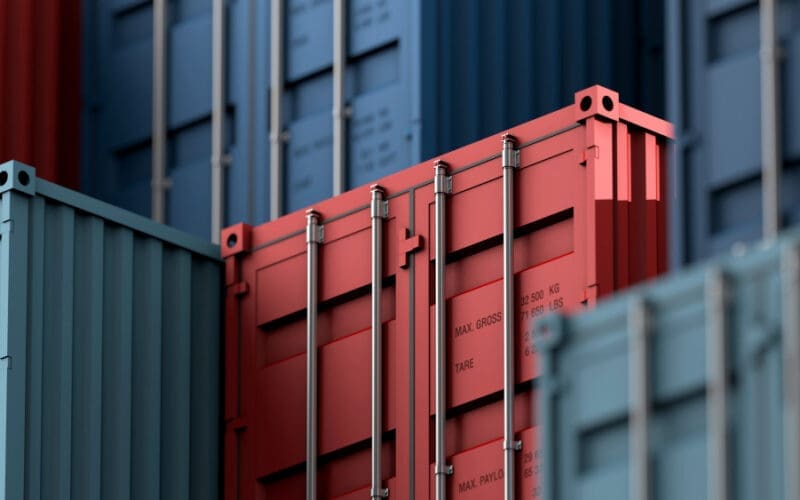 Containers stacked on a cargo freight ship for import and export logistics
