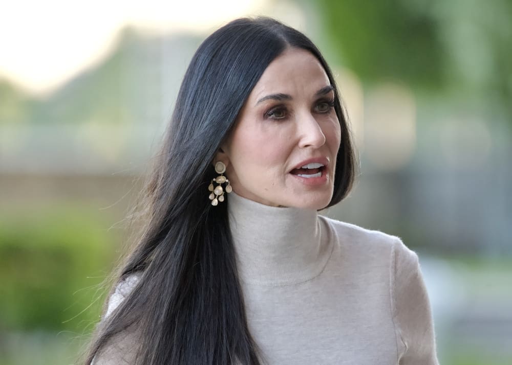 Demi Moore before entering the Max Mara fashion show in Stockholm City Hall