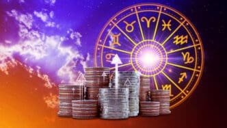 Horoscope with zodiac signs and money coins