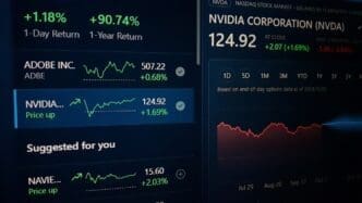 Image of a watchlist on a laptop, showcasing the stock price of NVIDIA and ADOBE corporations in real time and suggesting the forecast. By Shutterstock.com - Nwz
