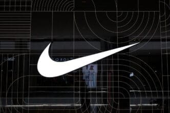 Kuala Lumpur, Malaysia on 17 August 2024 Nike logo on the wall of the store in Pavilion shopping mall KL. Nike is a global sports clothes and running shoes retailer