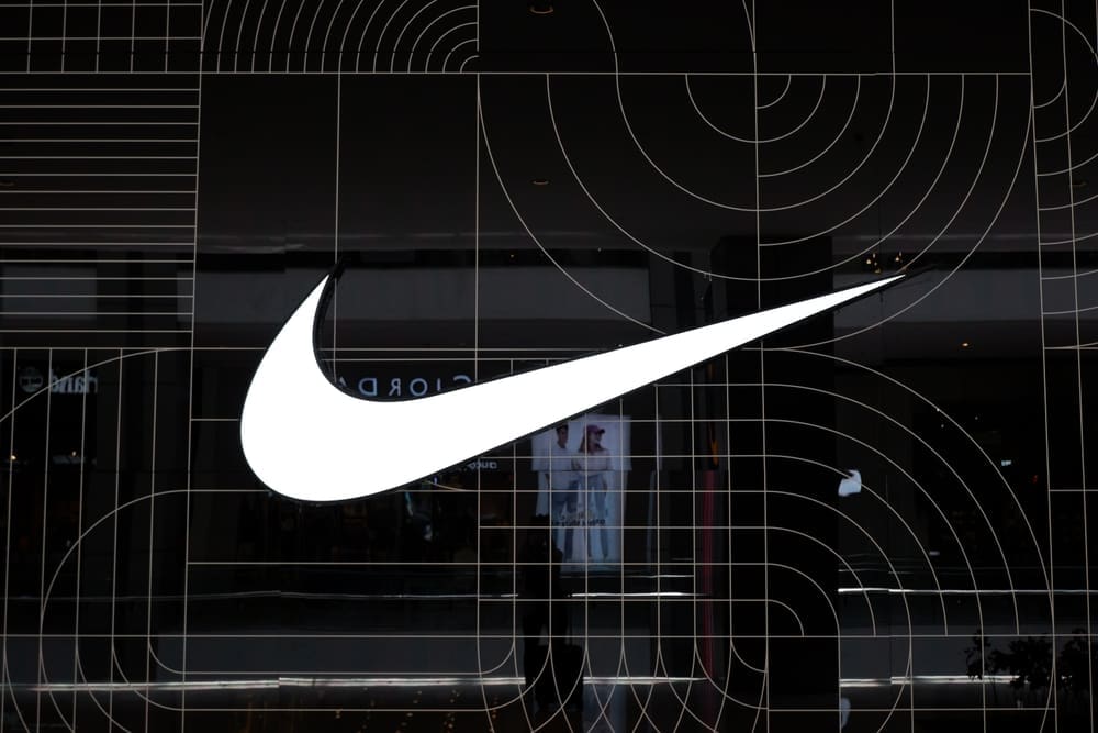 Kuala Lumpur, Malaysia on 17 August 2024 Nike logo on the wall of the store in Pavilion shopping mall KL. Nike is a global sports clothes and running shoes retailer