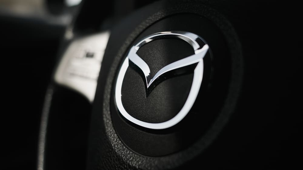 Munich, Germany - 28.03.2023 Mazda logo on the steering wheel.
