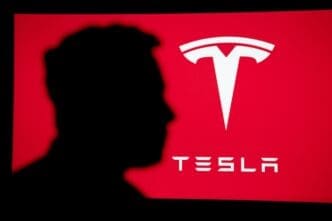 NEW YORK, USA, 2. OCTOBER 2022 Elon Musk CEO and product architect of Tesla, Inc. Portait on red background