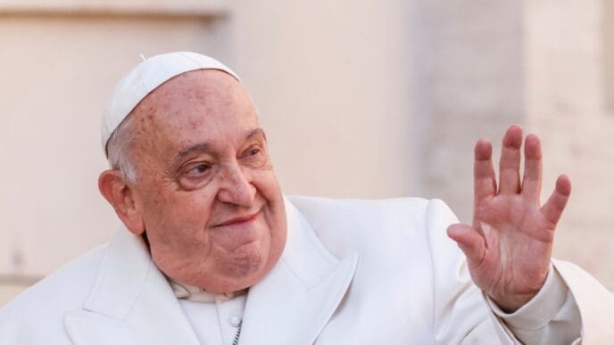 Pope Francis waves to the faithful as he arrives for his weekly general audience in St. PeterÕs Square, Vatican, December 4, 2024