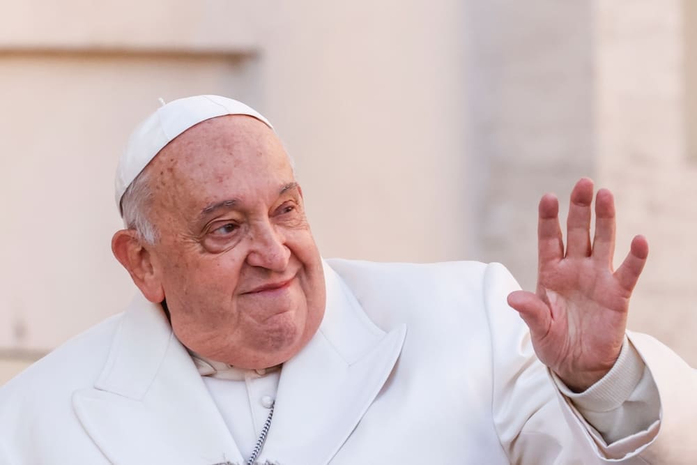 Pope Francis waves to the faithful as he arrives for his weekly general audience in St. PeterÕs Square, Vatican, December 4, 2024