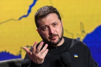 President of Ukraine Volodymyr Zelenskiy is answering questions from journalists during a large summary press conference in Kyiv, Ukraine, December 19, 2023. By Shutterstock.com - Paparazzza