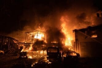 Russian forces hit Kharkiv with drone strikes. Emergency personnel work at the site of a drone strike in Kharkiv