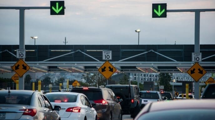 San Diego, California, US 07 - 12 - 2024 Cars waiting to get into Tijuana, Baja California, Mexico. Heavy traffic to cross Mexico International Border from San Diego