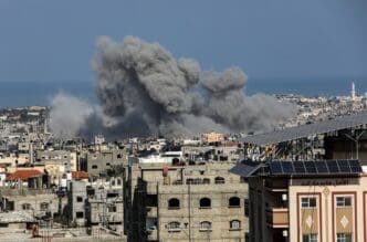 Smoke rises after Israeli air strikes near the border east of the city of Rafah in the southern Gaza Strip, on October 12 2023