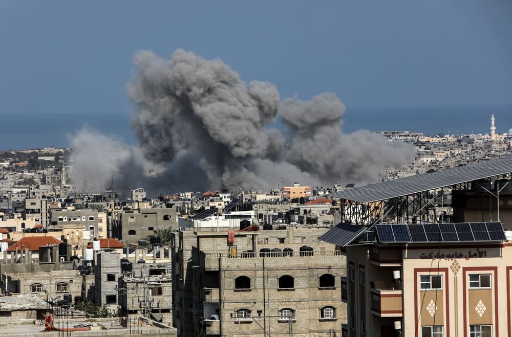 Smoke rises after Israeli air strikes near the border east of the city of Rafah in the southern Gaza Strip, on October 12 2023