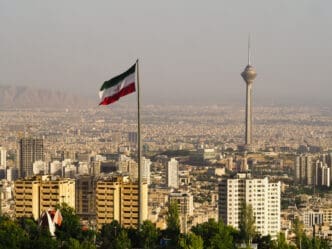 Tehran, Iran - April 28, 2019. Skyscrapers in Tehran, Iran. By Shutterstock.com - Vanchai Tan