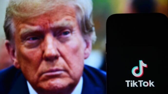 TikTok logo on smartphone screen and back silhouette US President Donald Trump. Tiktok is a social media platform originating from China. New York, USA. 10.12.2024