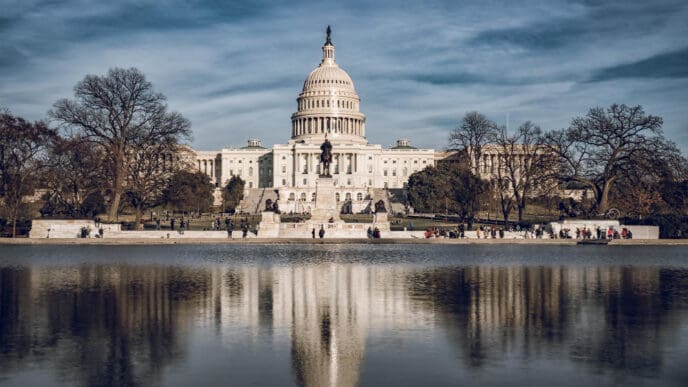 Capitol building reflecting in pool