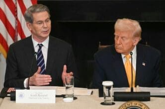 US President Donald Trump listen to US Secretary of Treasury Scott Bessent speak during a the White House Crypto Summit in Washington, DC, March 7, 2025.