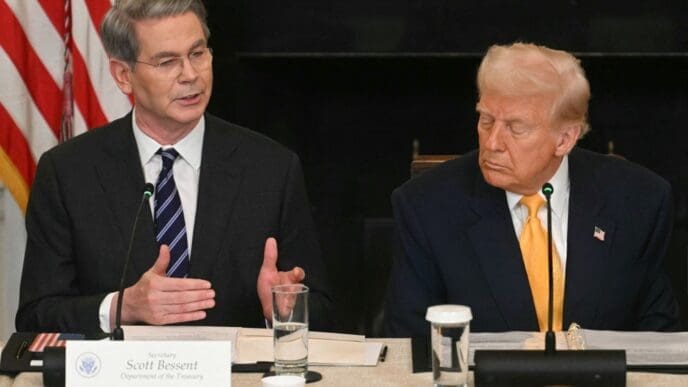 US President Donald Trump listen to US Secretary of Treasury Scott Bessent speak during a the White House Crypto Summit in Washington, DC, March 7, 2025.
