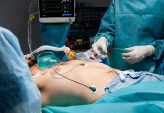 Doctors doing a surgical liver procedure