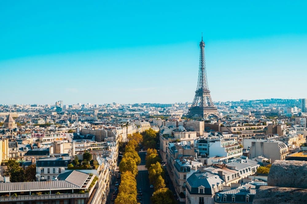 Cityscape of Paris under the sunlight and a blue sky