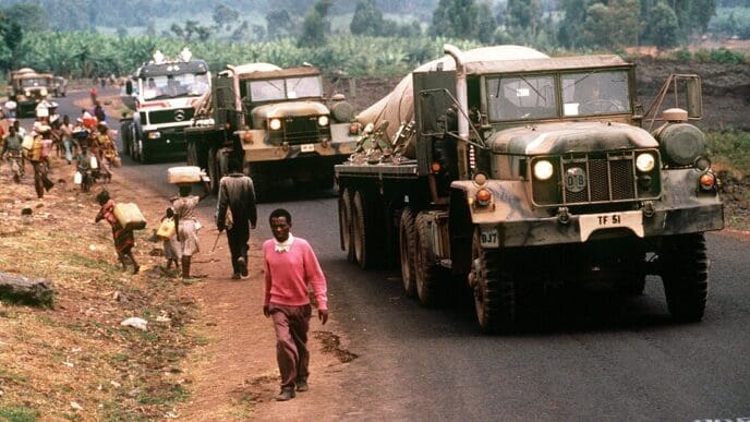 Convoy of American military vehicles bring fresh water from Goma to Rwandan refugees located at camp Kimbumba, Zaire in August 1994