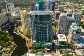 FORT LAUDERDALE, FL. Aerial photo of Icon Las Olas a luxury highrise condominium apartment building in Fort Lauderdale. By Shutterstock.com - Felix Mizioznikov