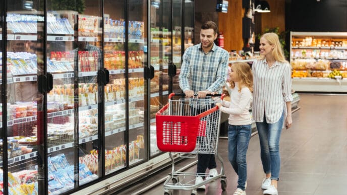 A family is shopping in the supermarket