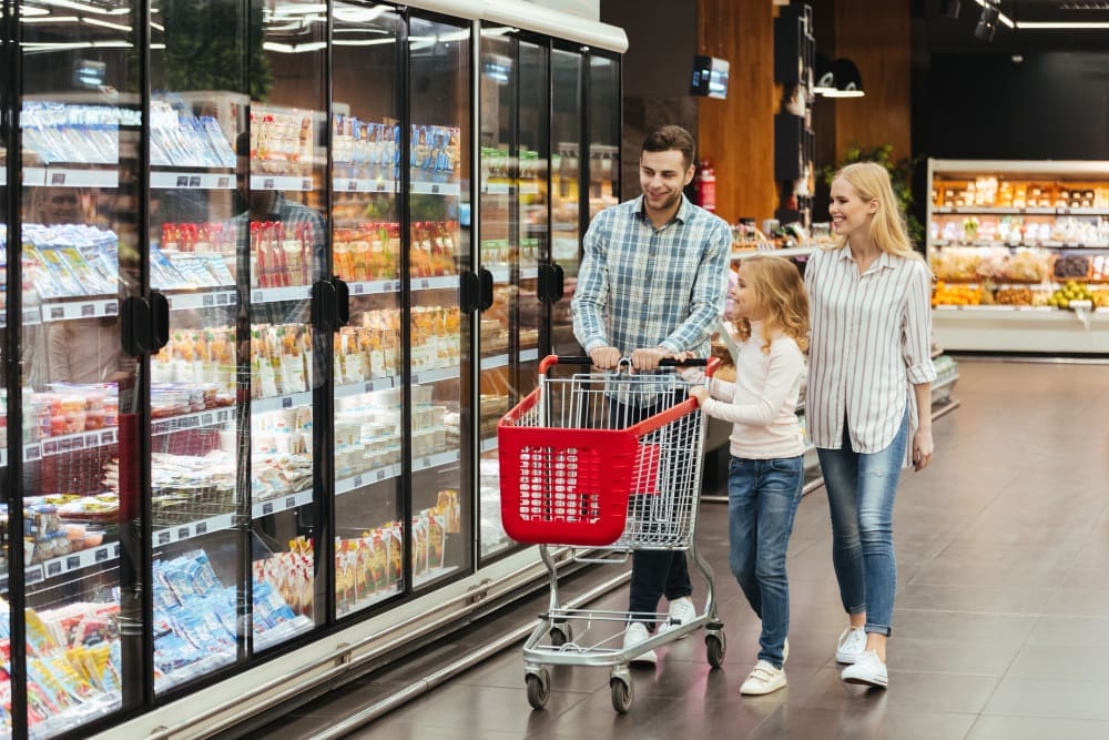 A family is shopping in the supermarket
