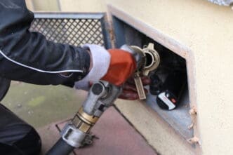 Heating oil home delivery. By Shutterstock.com - U. J. Alexander