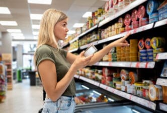 Medium shot woman checking prices