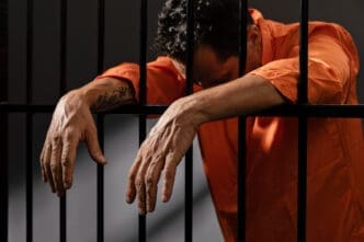 Middle aged man spending time in jail