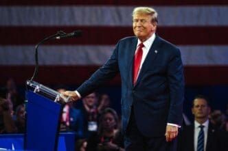 NATIONAL HARBOR, MD - February 24, 202.4 Donald Trump speaks at an event about his plan for defeating Joe Biden in November. By Shutterstock.com - Jonah Elkowitz