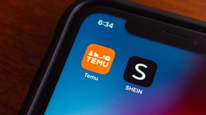 Temu and Shein app icons seen in an iPhone. By Shutterstock.com - Koshiro K