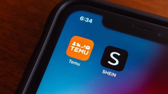 Temu and Shein app icons seen in an iPhone. By Shutterstock.com - Koshiro K