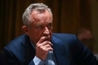 US Secretary of Health and Human Services Robert F. Kennedy Jr. listens as President Trump holds a cabinet meeting at the White House in Washington, DC, on Feb 26, 2025. By Shutterstock - Jimwatson