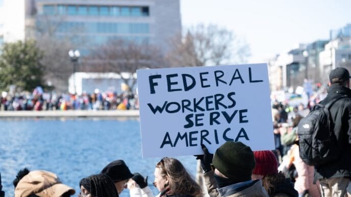 WASHINGTON DC - FEBRUARY 17, 2025. Demonstrators gather at the U.S. Capitol to protest the actions of President Trump’s administration and Elon Musk in Washington DC on President’s day. By Shutterstock - Rena Schild