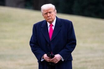 WASHINGTON – Feb 22, 2025. President Donald Trump arrives at the White House South Lawn on Marine One after his visit to CPAC. By Shutterstock.com - Joshua Sukoff