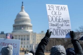 Washington DC Feb 17, 2025. Demonstrators gather at the U.S. Capitol to protest the actions of President Trump’s administration and billionaire Elon Musk on President’s Day. By Shutterstock - Rena Schild