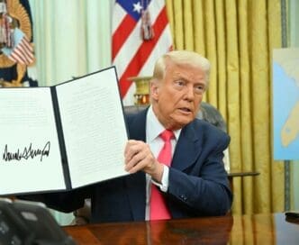 Washington, DC on March 6, 2025. President Trump showing signing an executive order in the Oval Office of the White House. By Shutterstock.com - Babooo0