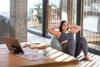 Wide shot of a woman exercising in the morning