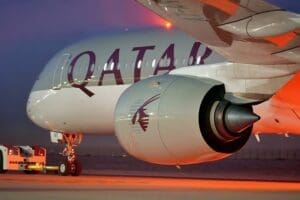 Dubai, UAE - Nov 20th 2023 A Qatar Airways A350 is tugged to its display location at the 2023 Dubai Airshow at dusk