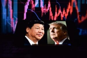 Photos of U.S. President Donald Trump and President of the People's Republic of China Xi Jinping appear on a smartphone screen. 12.04.2025. New York, USA.