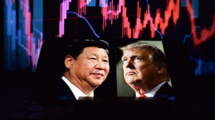 Photos of U.S. President Donald Trump and President of the People's Republic of China Xi Jinping appear on a smartphone screen. 12.04.2025. New York, USA.